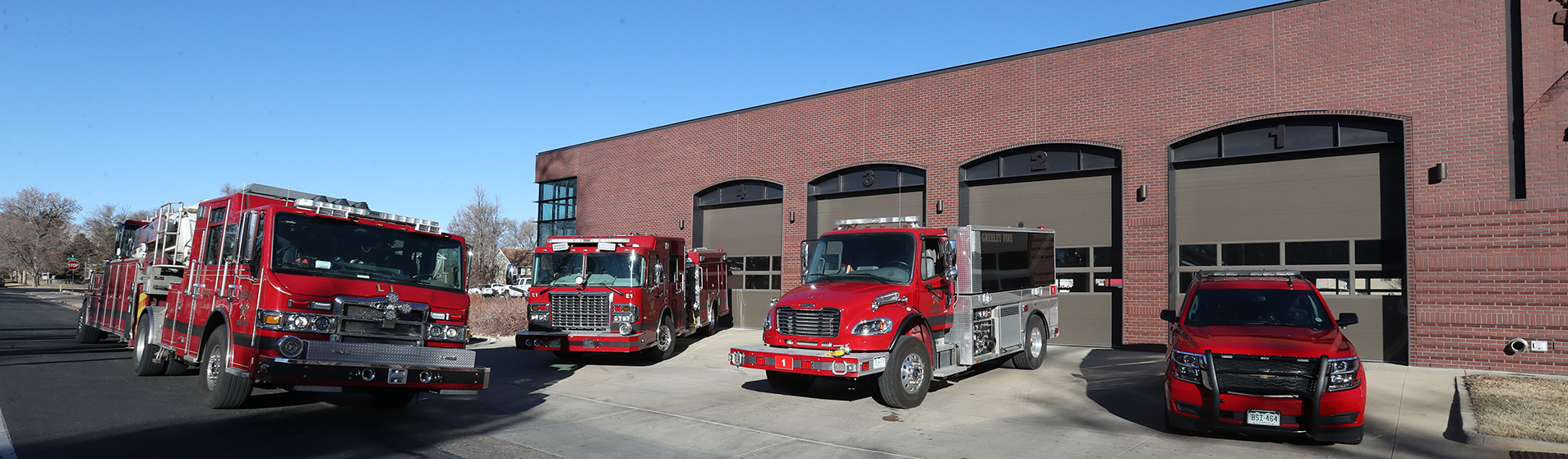 Greeley fire station 1 with emergency vehicles parked in front